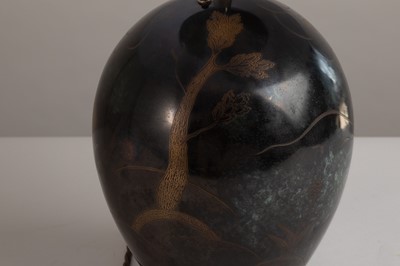 Lot 60 - A dinanderie table lamp