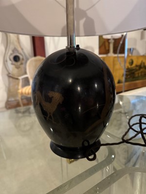 Lot 60 - A dinanderie table lamp