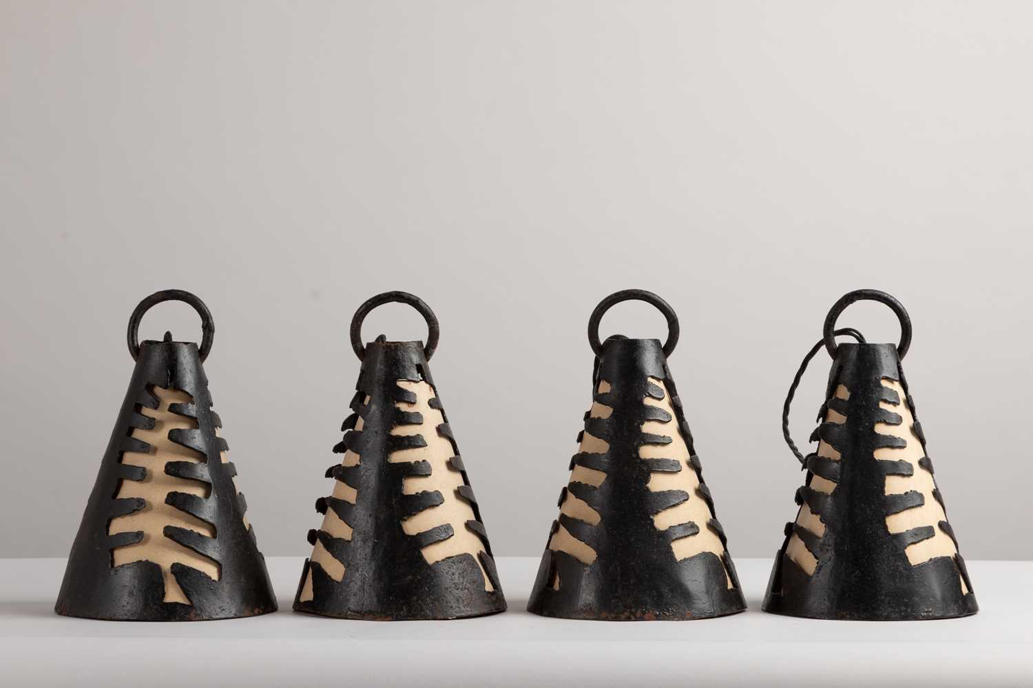 Lot 92 - A set of four wrought-iron ceiling lights