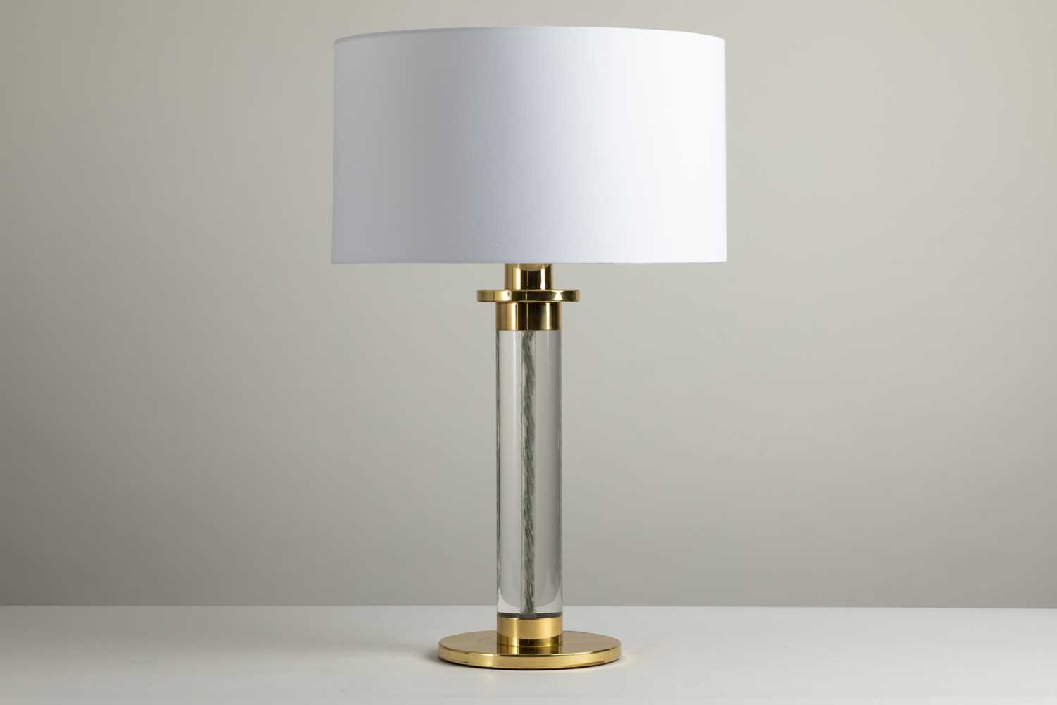 Lot 172 - A Lucite and brass-mounted table lamp