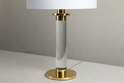 Lot 172 - A Lucite and brass-mounted table lamp