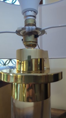 Lot 172 - A Lucite and brass-mounted table lamp