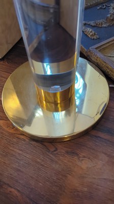 Lot 172 - A Lucite and brass-mounted table lamp