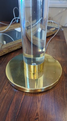 Lot 172 - A Lucite and brass-mounted table lamp