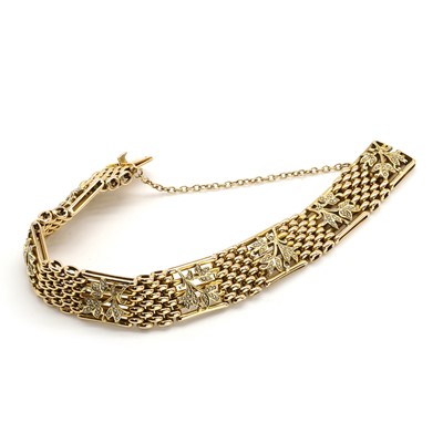 Lot 25 - An Edwardian split pearl gate bracelet