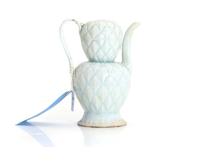 Lot 57 - A Chinese Qingbai ware ewer and cover