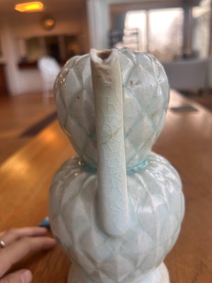 Lot 57 - A Chinese Qingbai ware ewer and cover