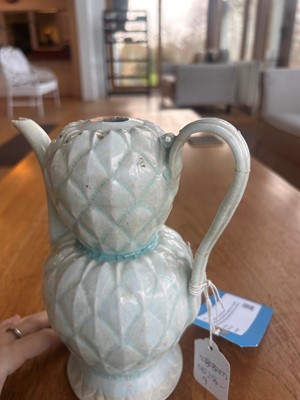 Lot 57 - A Chinese Qingbai ware ewer and cover