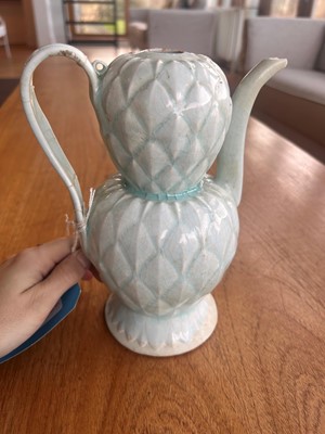 Lot 57 - A Chinese Qingbai ware ewer and cover
