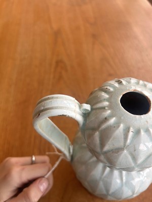 Lot 57 - A Chinese Qingbai ware ewer and cover