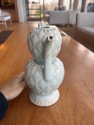 Lot 57 - A Chinese Qingbai ware ewer and cover