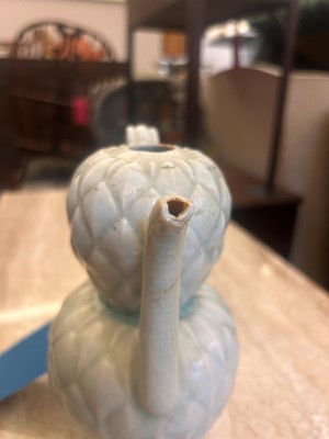 Lot 57 - A Chinese Qingbai ware ewer and cover