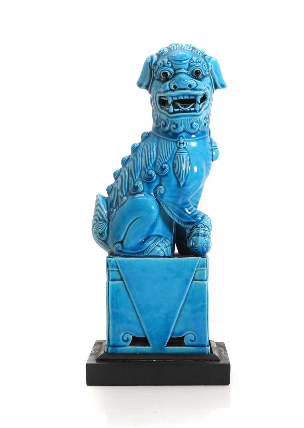 Lot 92 - A Chinese turquoise-glazed figure