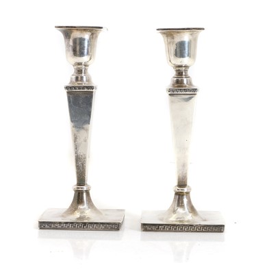 Lot 37 - A pair of silver candlesticks