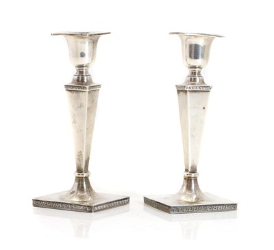 Lot 37 - A pair of silver candlesticks