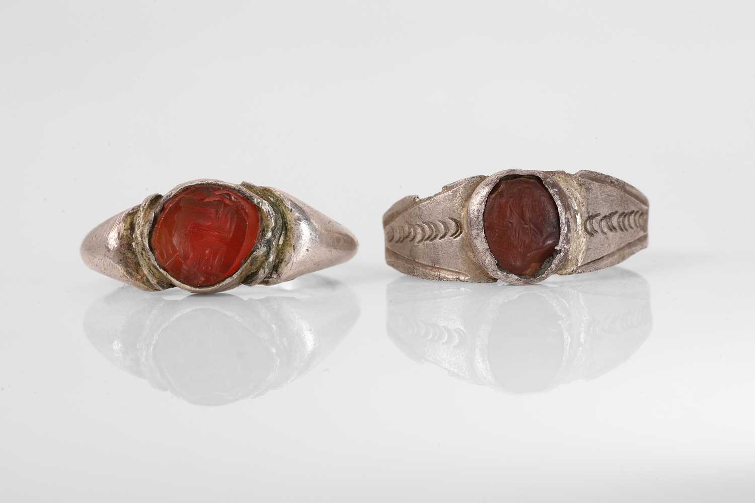 Lot 309 - Two carnelian-set intaglio rings