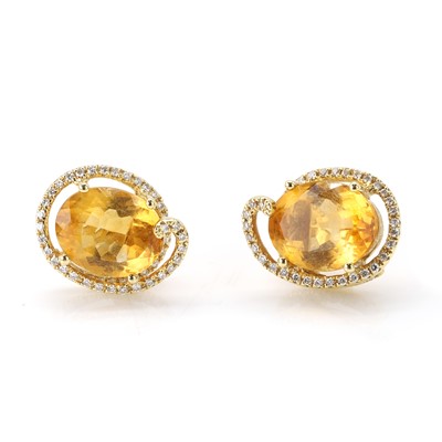 Lot 157 - A pair of citrine and diamond stud earrings
