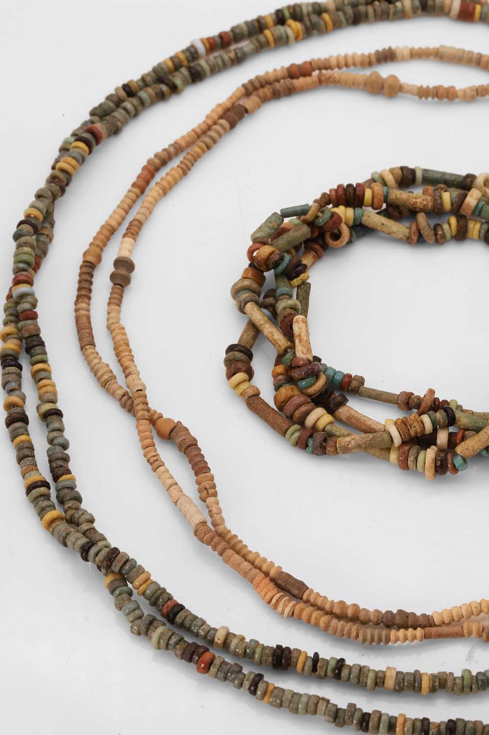 Lot 308 - A collection of Egyptian beaded necklaces