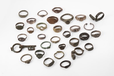 Lot 189 - A collection of ancient-style metal and glass rings