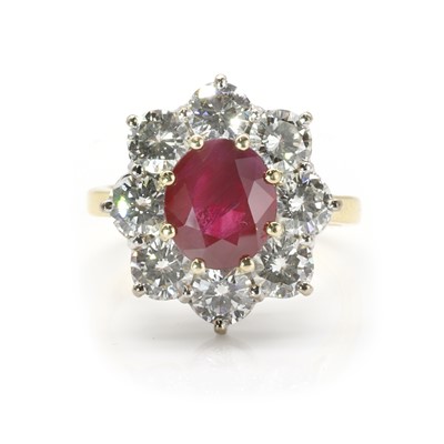Lot 202 - An 18ct gold ruby and diamond cluster ring