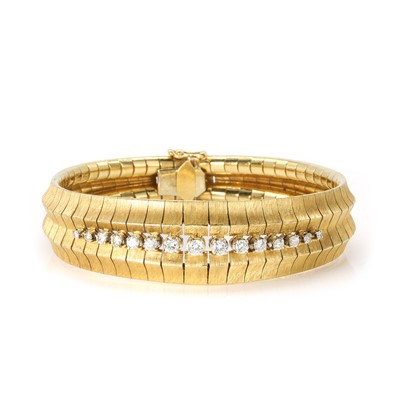 Lot 69 - An 18ct gold diamond cuff bracelet, c.1960
