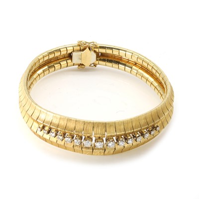 Lot 69 - An 18ct gold diamond cuff bracelet, c.1960