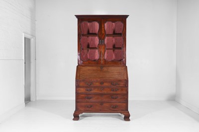 Lot 460 - A George II mahogany bureau bookcase in the manner of Giles Grendey
