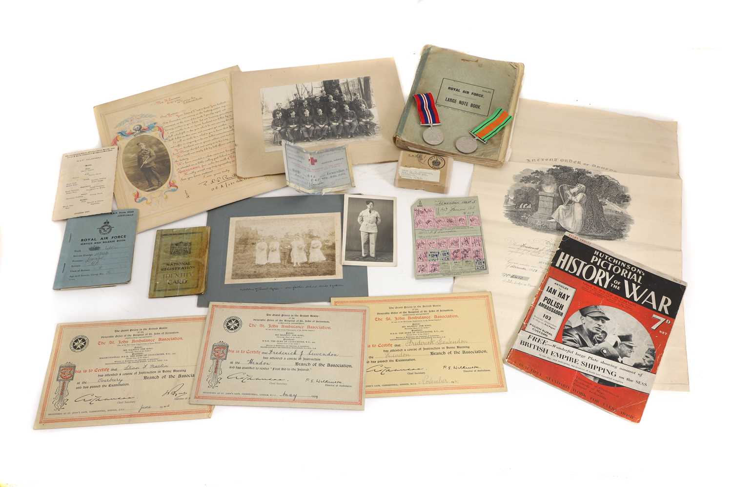 Lot 382 - A collection of military documents and photographs of the Lewedon family