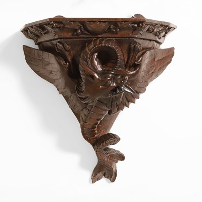 Lot 59 - A carved oak Arts & Crafts wall bracket