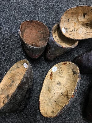Lot 44 - A strange group of papier mâché masks