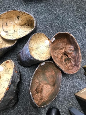 Lot 44 - A strange group of papier mâché masks