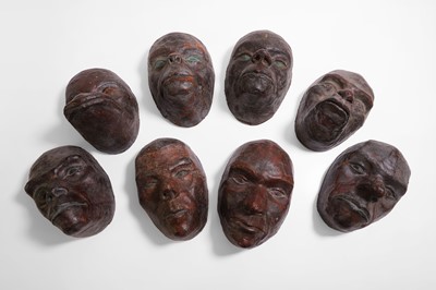 Lot 44 - A strange group of papier mâché masks