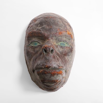 Lot 44 - A strange group of papier mâché masks