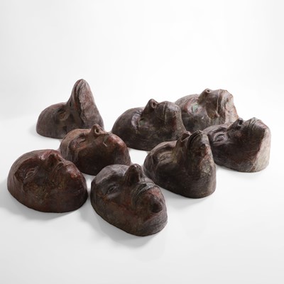Lot 44 - A strange group of papier mâché masks