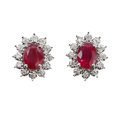 Lot 120 - A pair of white gold ruby and diamond cluster stud earrings
