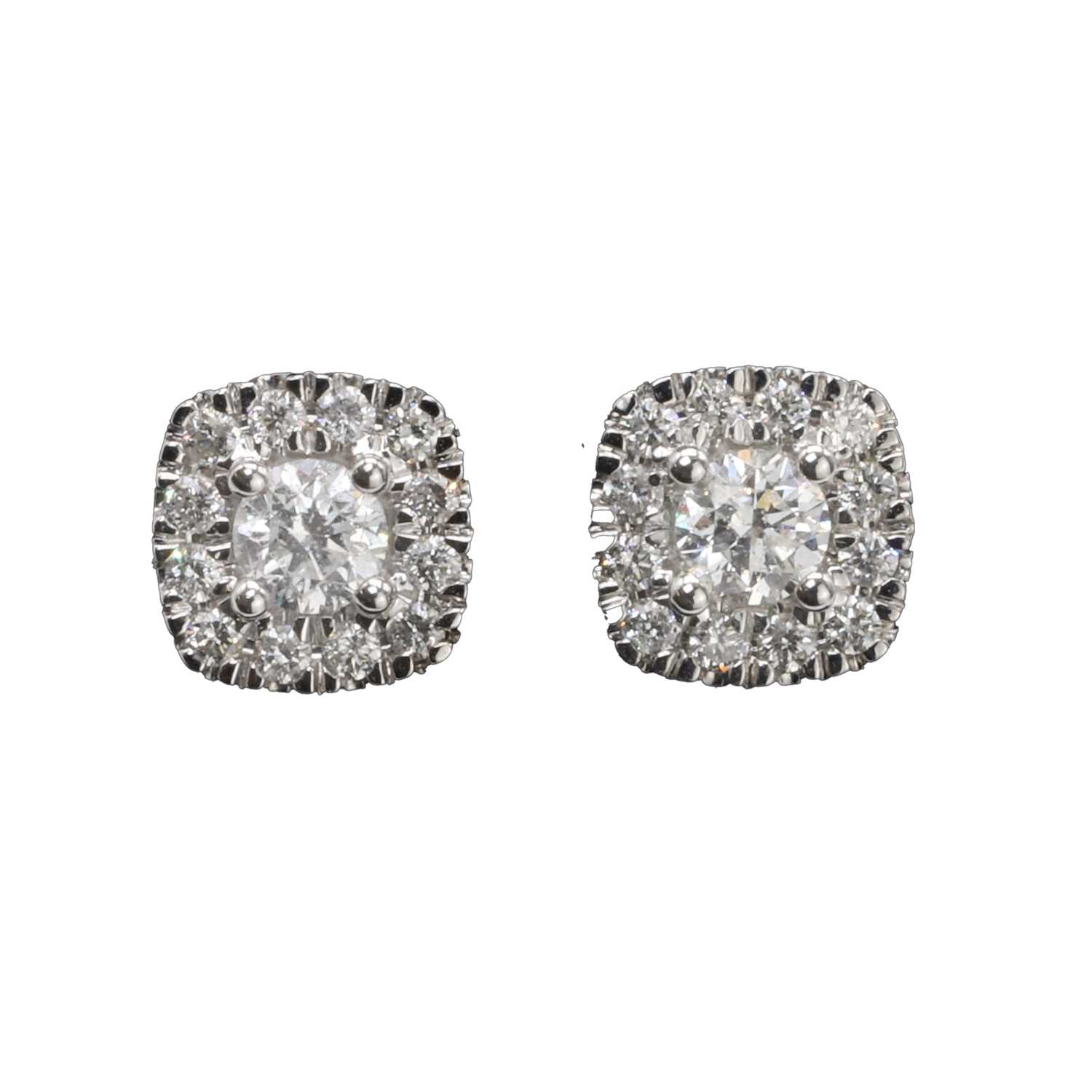 Lot 87 - A pair of diamond cluster earrings