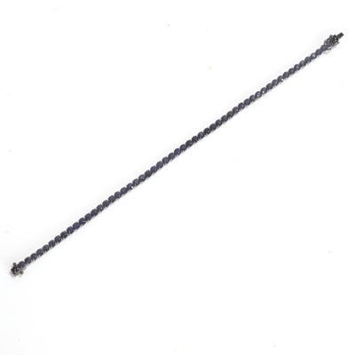 Lot 136 - A sapphire line bracelet
