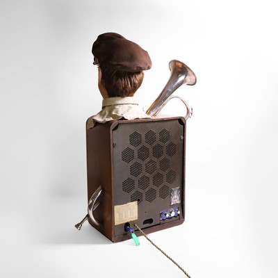 Lot 79 - A Lissen valve radio adapted to play Glenn Miller