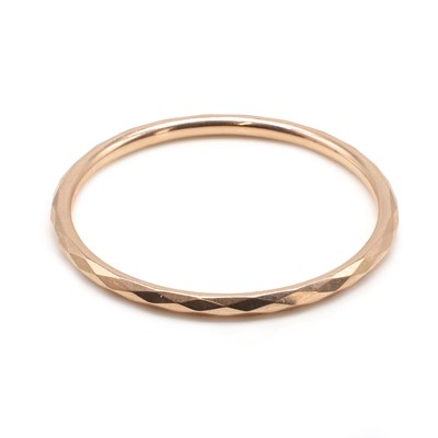 Lot 471 - A 9ct rose gold bangle