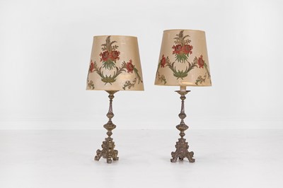 Lot 98 - A pair of silver-plated brass altar candlestick lamps