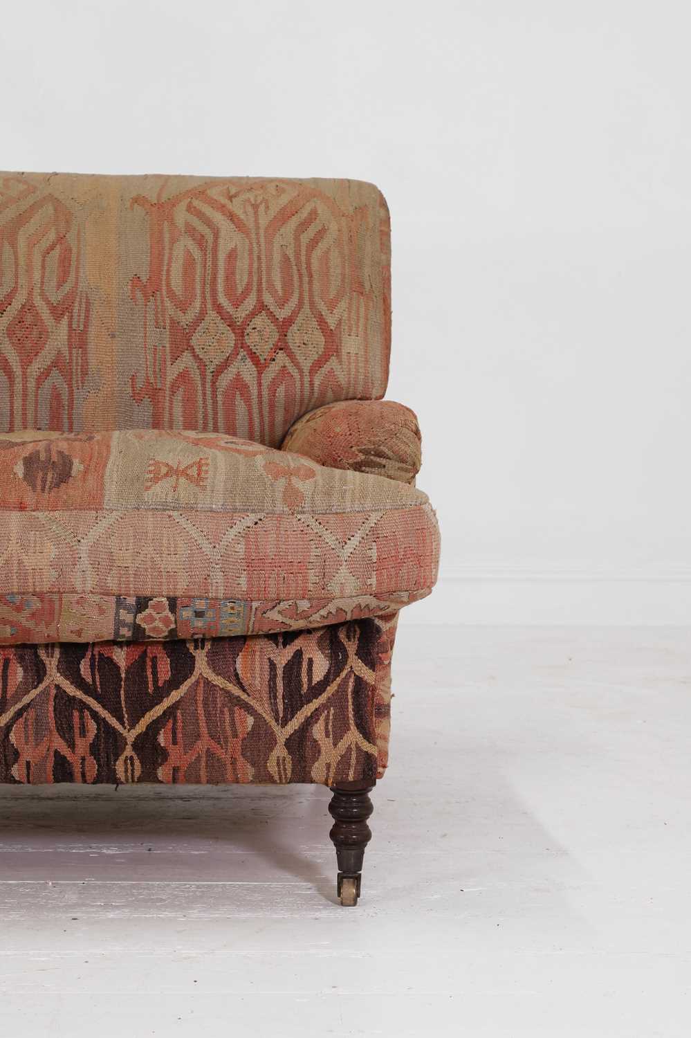 Lot 42 - A kilim-covered sofa by George Smith