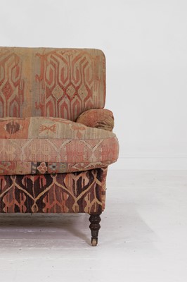 Lot 42 - A kilim-covered sofa by George Smith