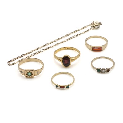 Lot 396 - A group of five rings and a bracelet