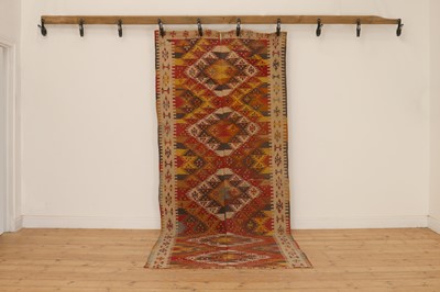 Lot 334 - A kilim flatweave wool rug