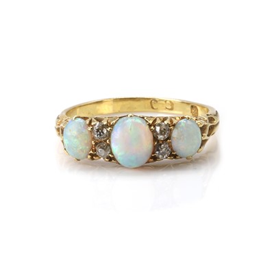 Lot 31 - An opal and diamond three stone ring