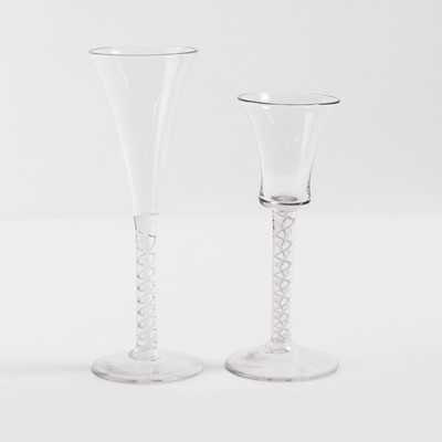Lot 16 - Two mixed-twist drinking glasses