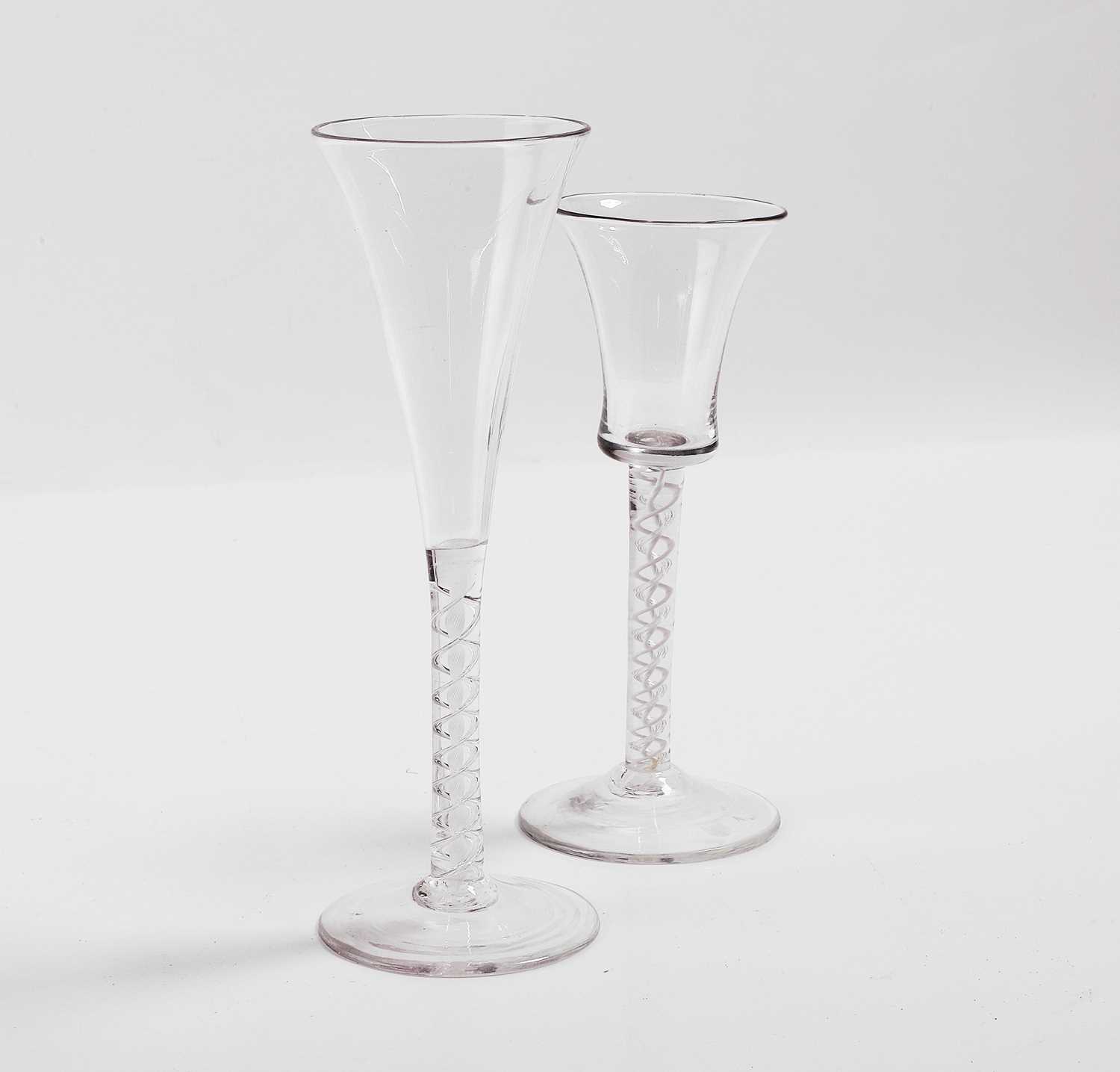 Lot 16 - Two mixed-twist drinking glasses