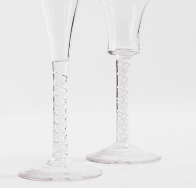 Lot 16 - Two mixed-twist drinking glasses