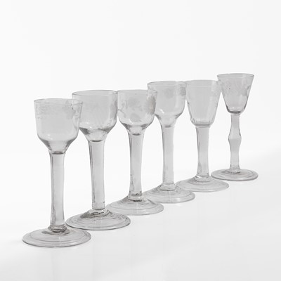 Lot A group of plain stem wine glasses