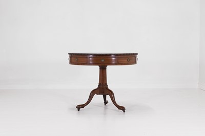 Lot 453 - A small George III mahogany drum library table